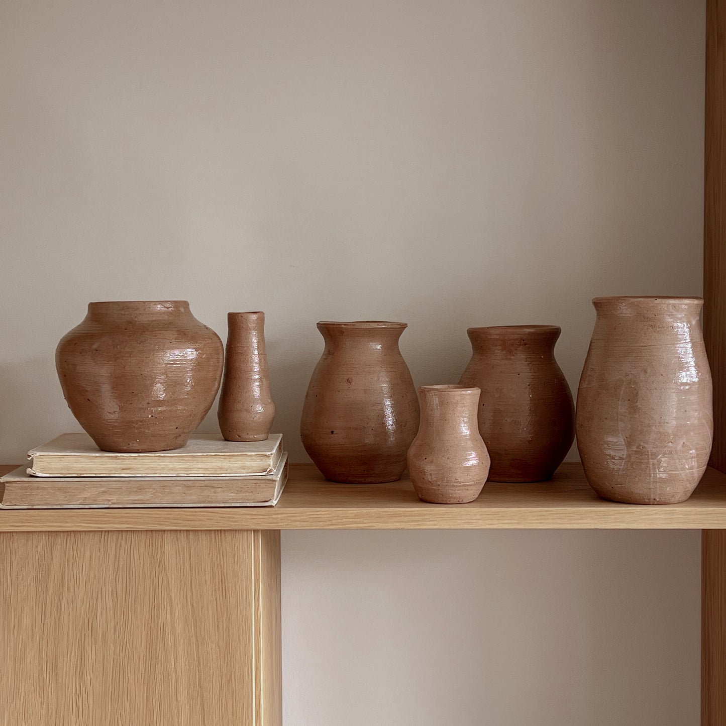 pre-loved - set of 7 Handmade Glazed Earthenware Pots/Vases