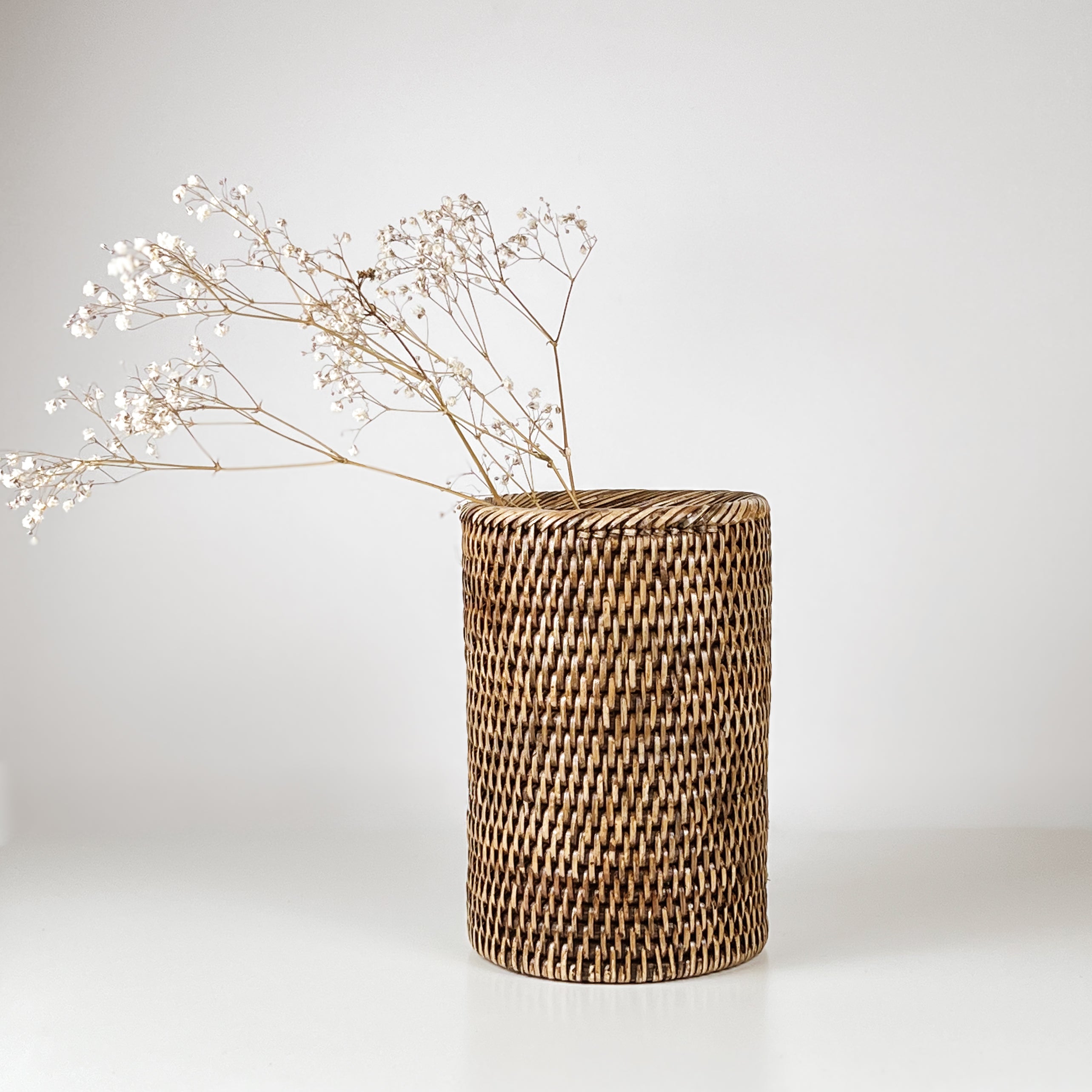 rotan vaas - flessenhouder – pre-loved Noii HOME