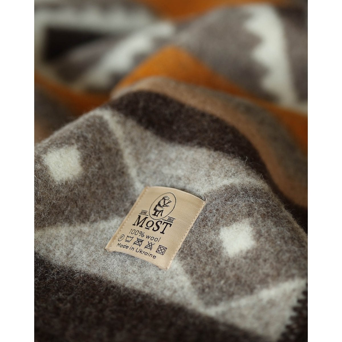 Wollen beddeken TRIBE - eenpersoons - brons MoST Blankets